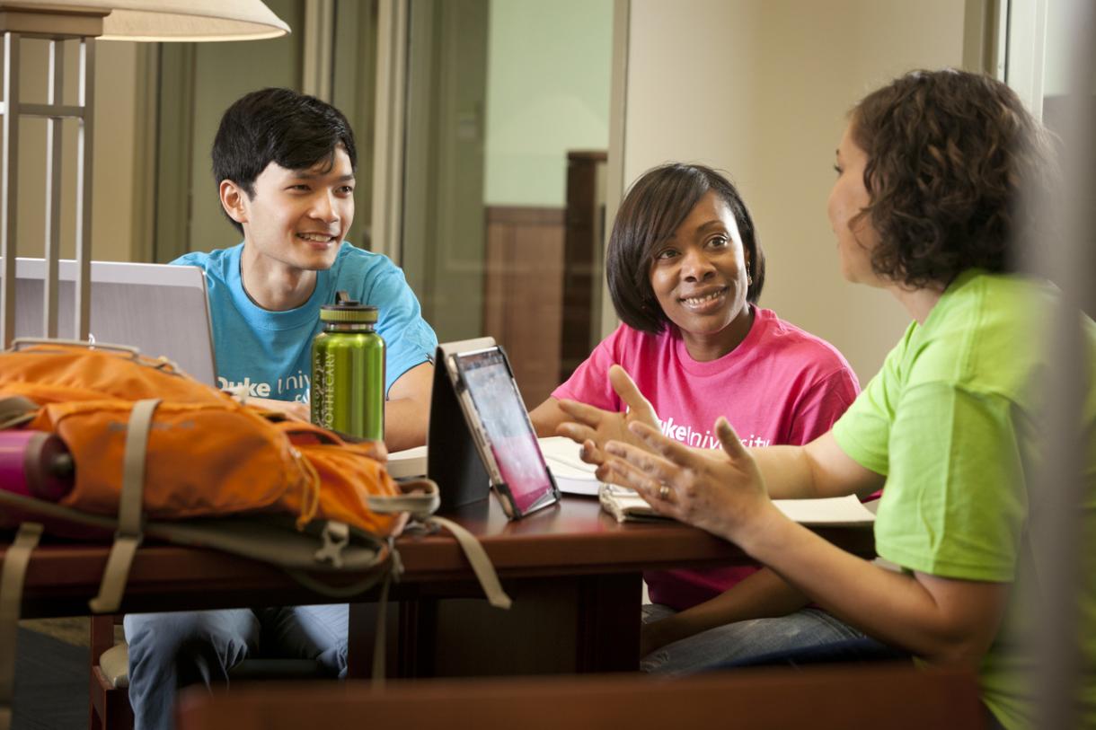 People talking at a table